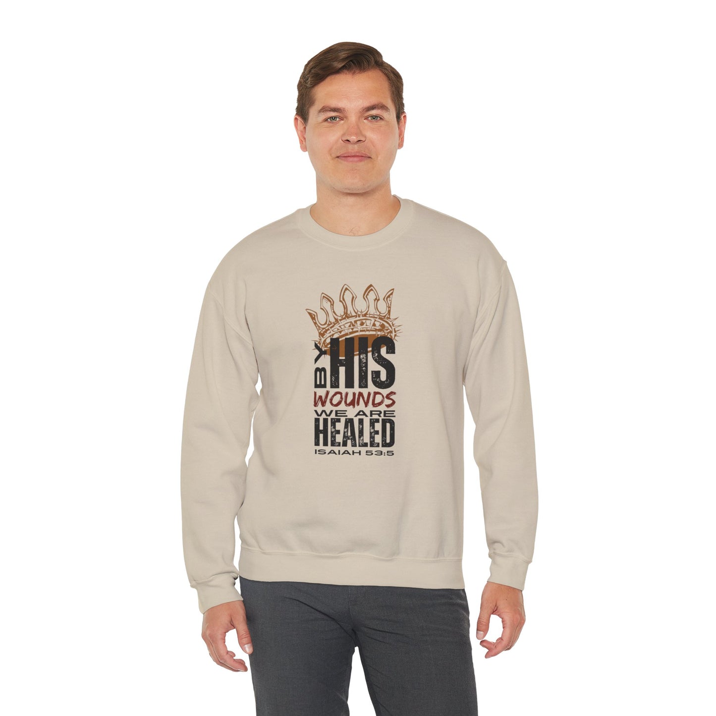 Beige Christ our Healer sweatshirt featuring a bold graphic and scripture from Isaiah 53:5
