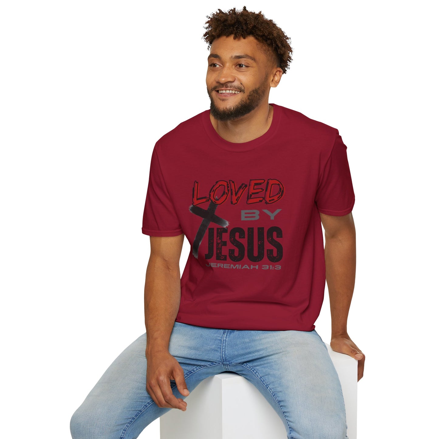 Man wearing Cardinal Red Christian graphic t-shirt with Loved by Jesus print and cross design