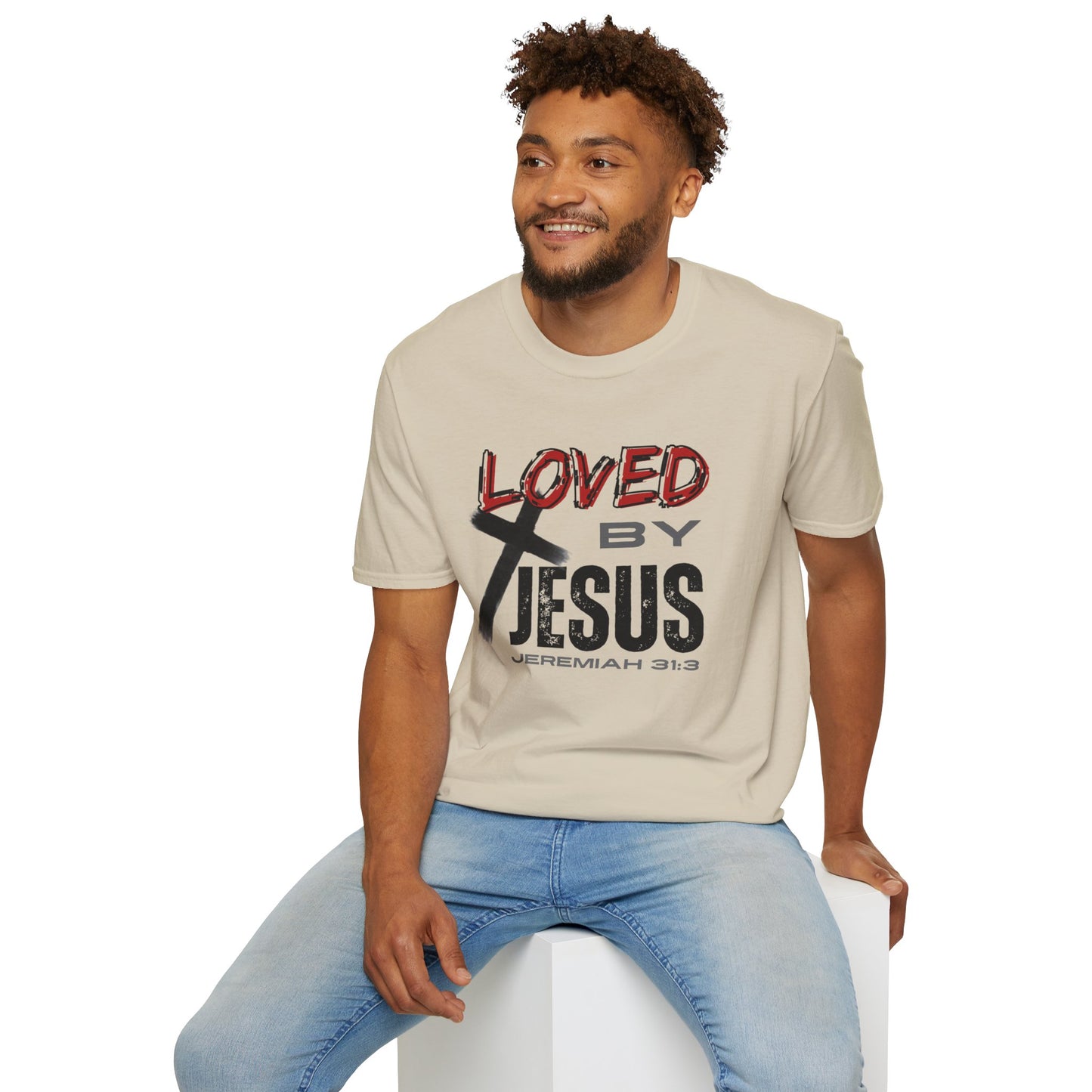 Christian graphic t-shirt with Loved by Jesus Jeremiah 31 3 design worn by a man
