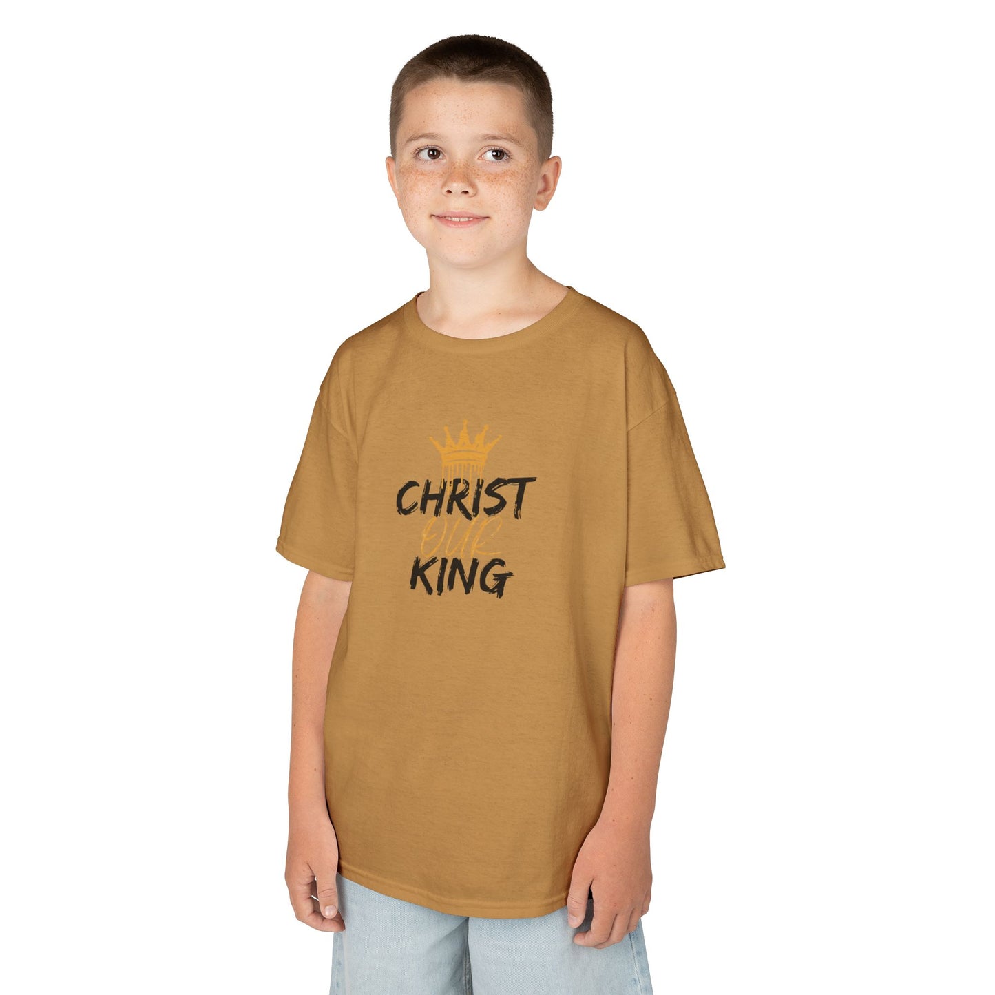 Logos Co. Christian junior kids t-shirt in brown with Christ King graphic worn by a young boy