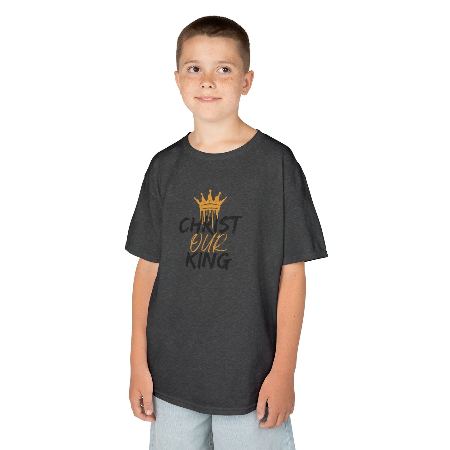 Christian junior kids t-shirt in charcoal gray with gold crown and text design worn by boy