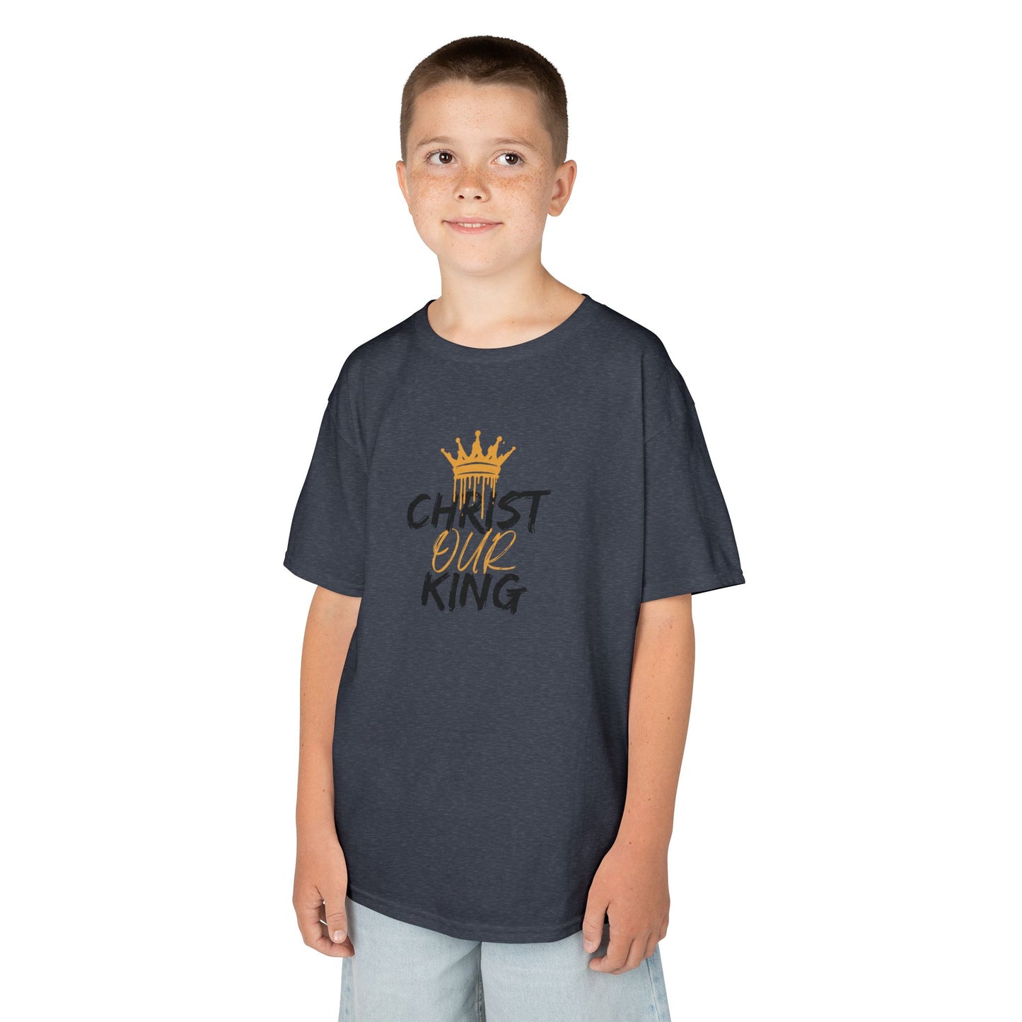 Christian junior kids t-shirt in dark gray with gold crown and text print worn by young boy