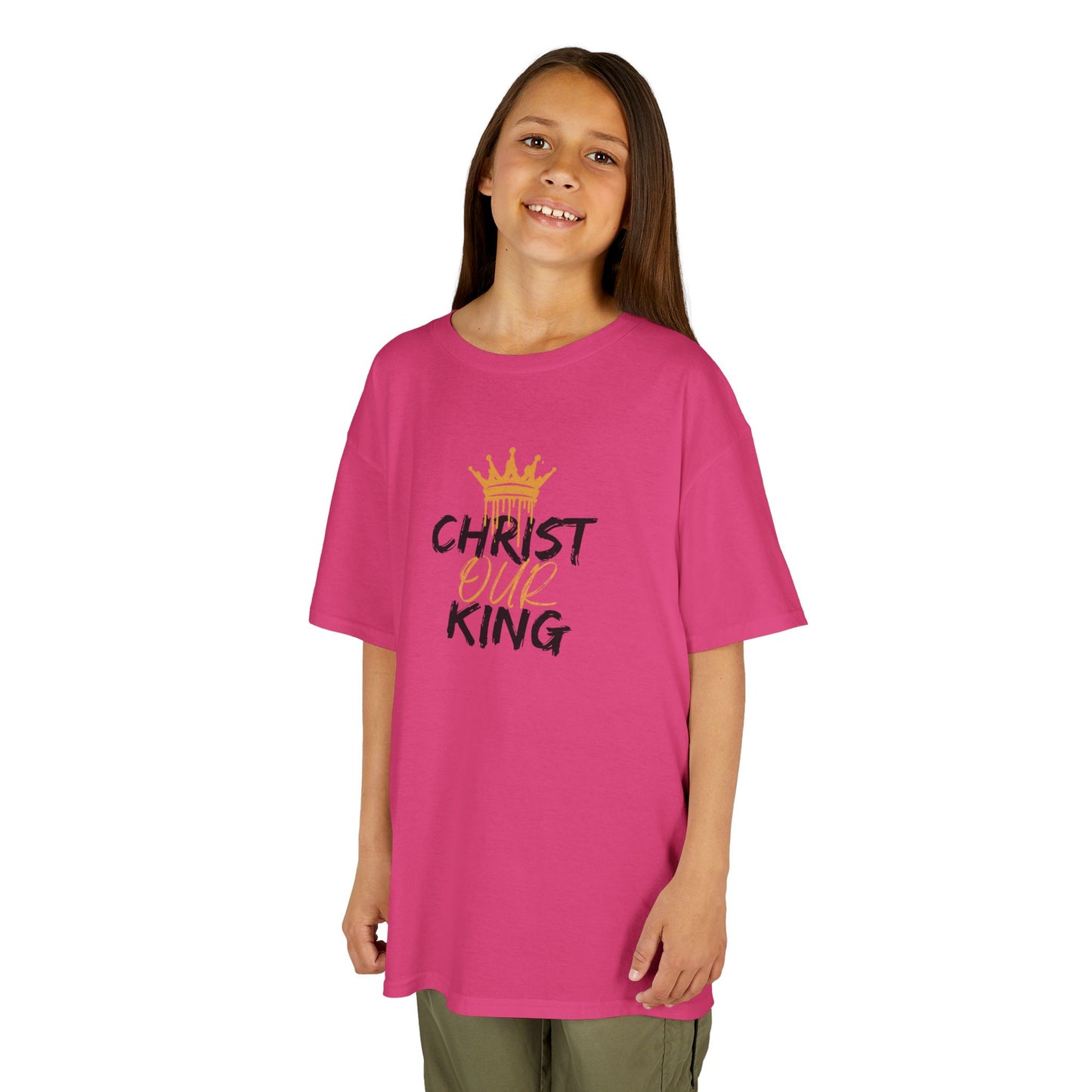 Pink Christian junior kids t-shirt with Christ Our King graphic worn by a girl