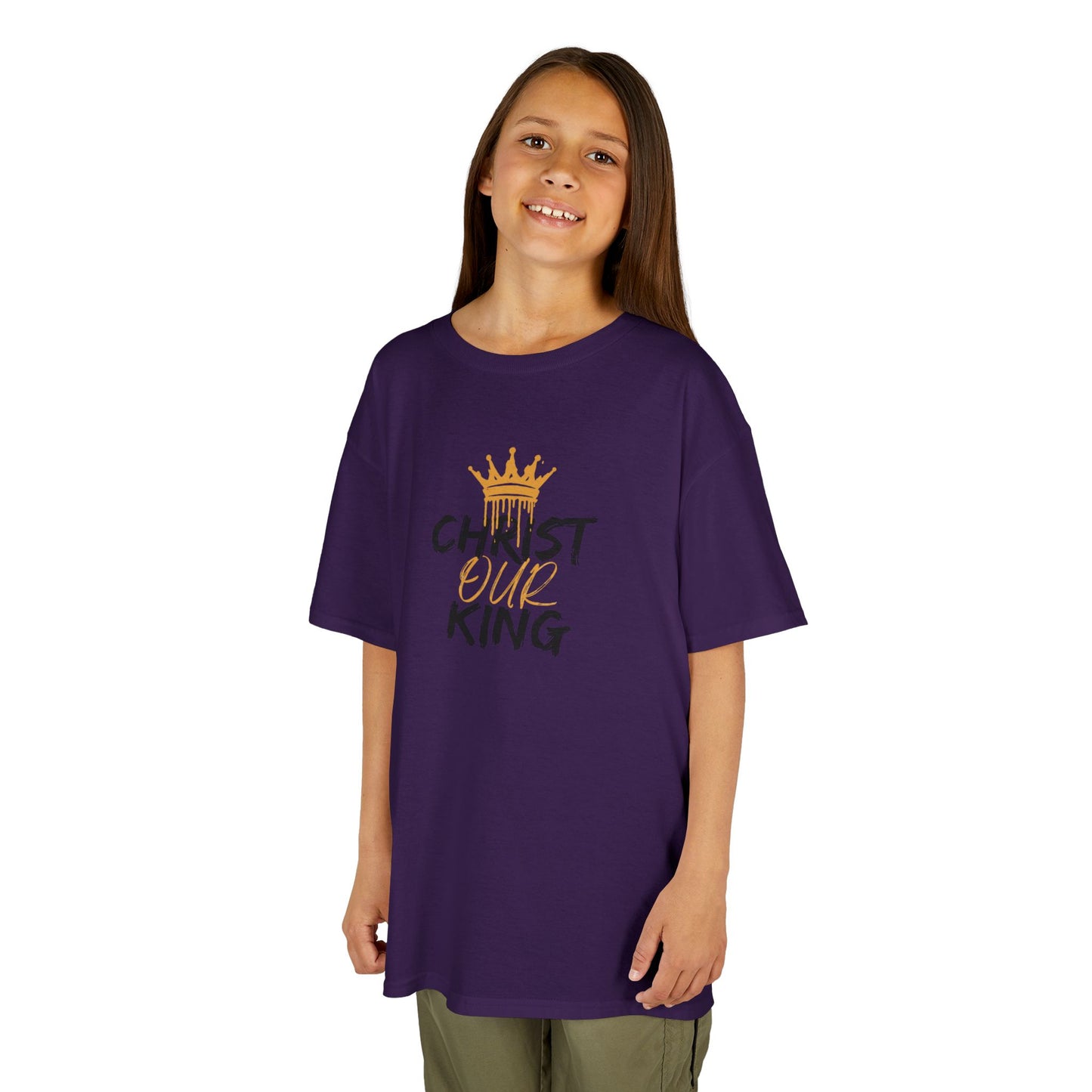 Christian junior kids t-shirt in purple with gold crown and text design worn by a girl