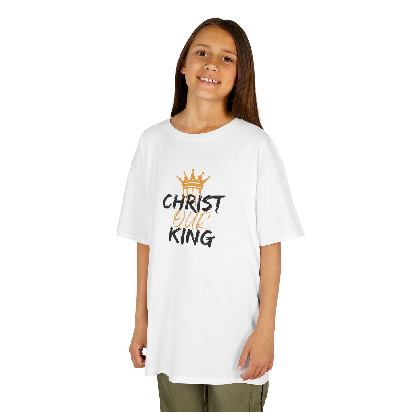 Christian junior kids t-shirt white with Christ Our King graphic worn by smiling child