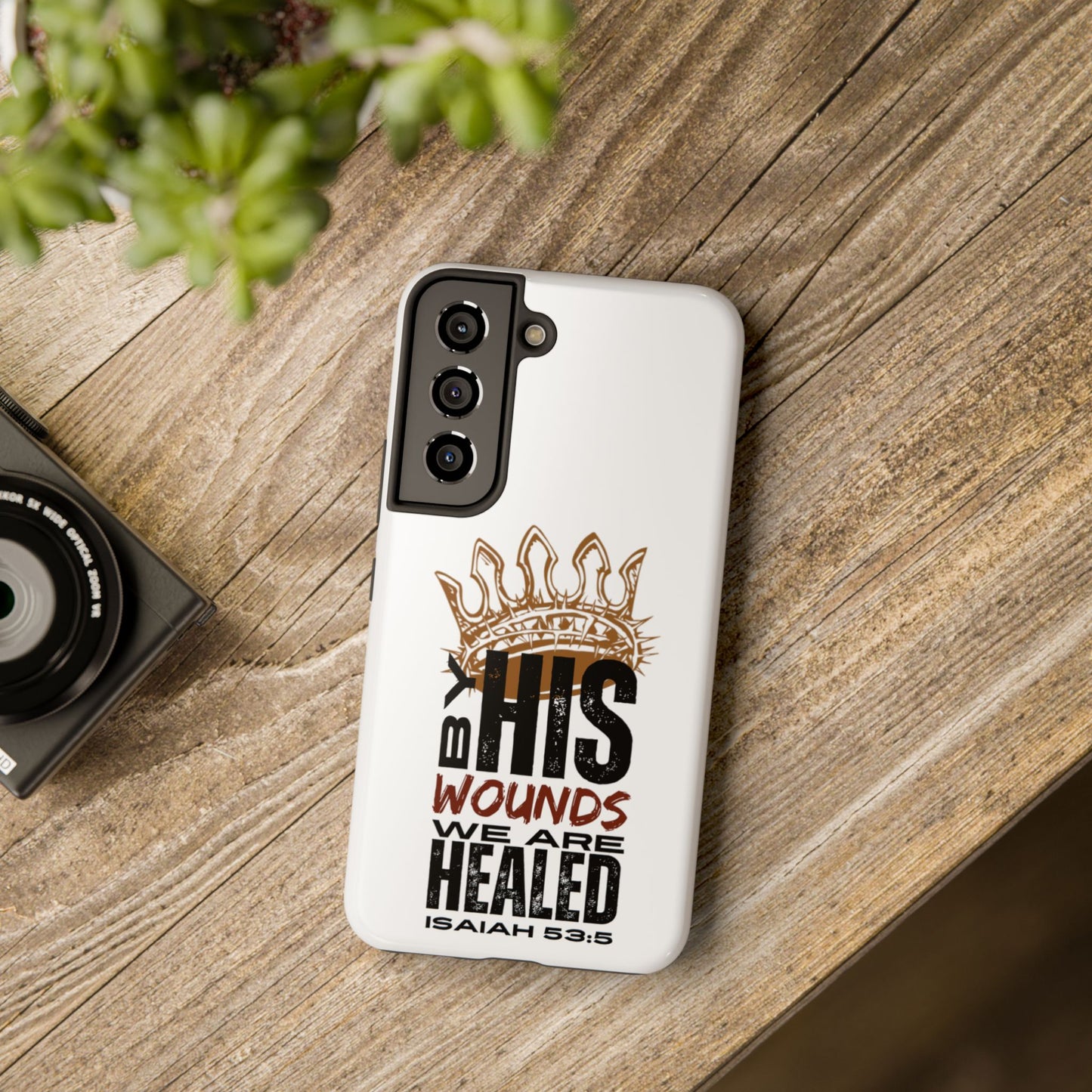 Christian tough phone case with Bible verse Isaiah 53:5 and crown design on white background