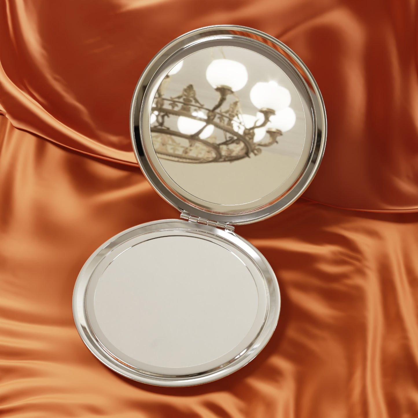 Silver compact Spirit Lead Me Christian travel mirror open on a shiny copper satin fabric background