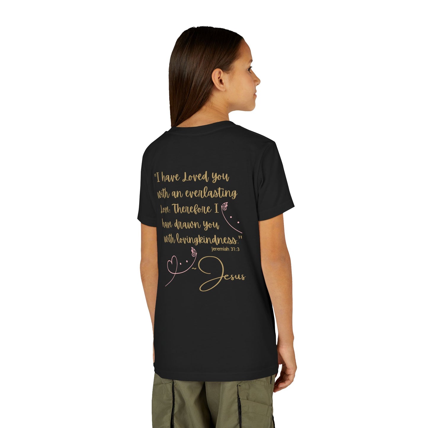 Back view of child wearing black Logos Co. Jesus Loves Me youth shirt with gold script Bible verse design