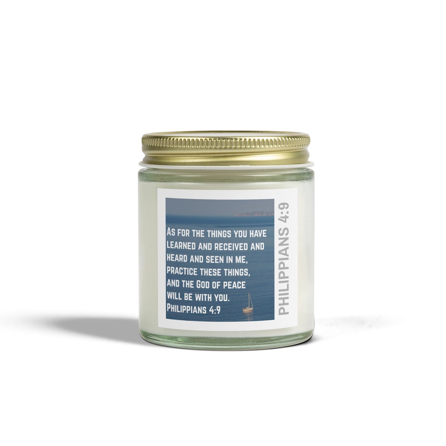 Logos eco-friendly Christian candle with Philippians 4:9 scripture in glass jar and gold lid