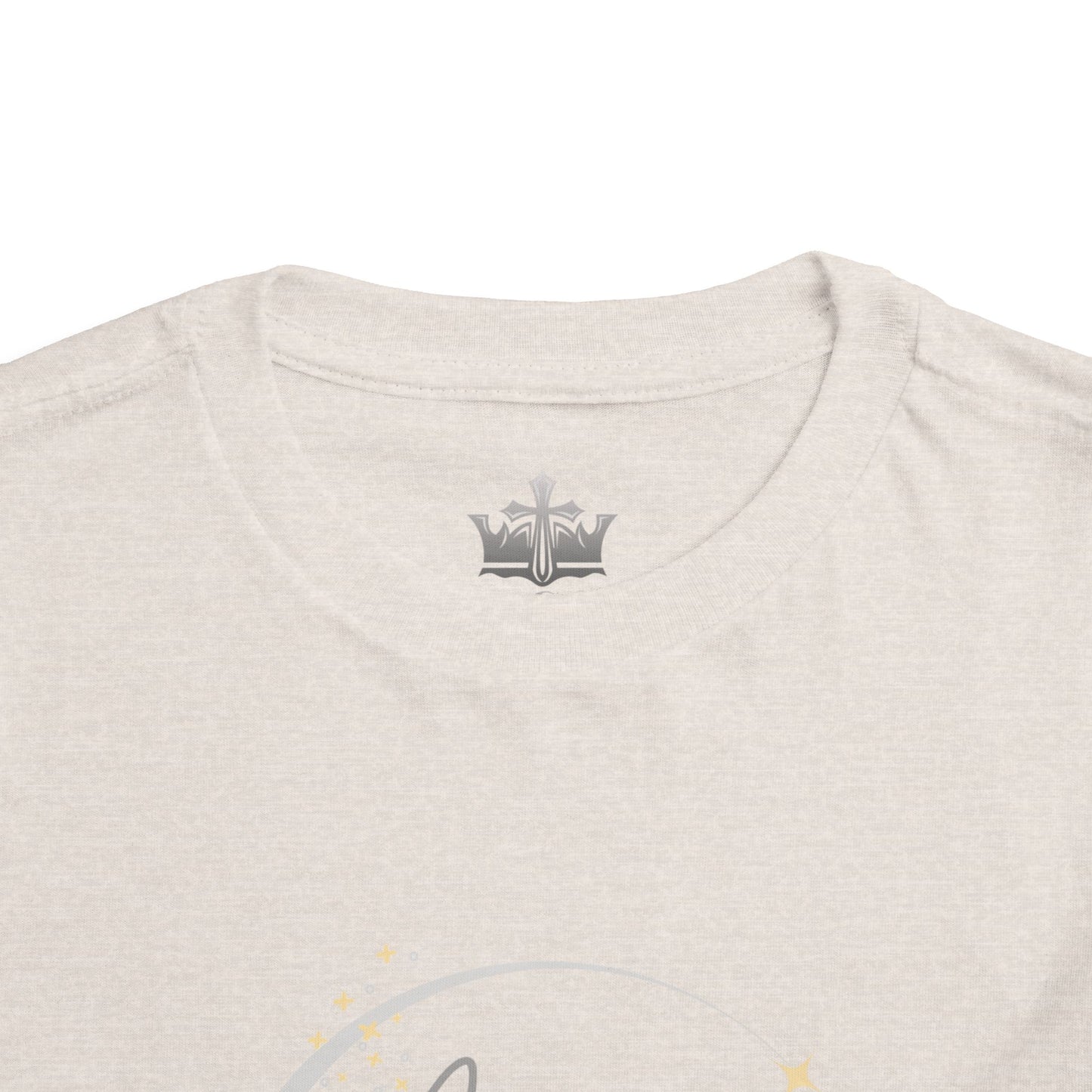 Close-up of a beige girls scripture tee collar from Logos made of soft cotton fabric