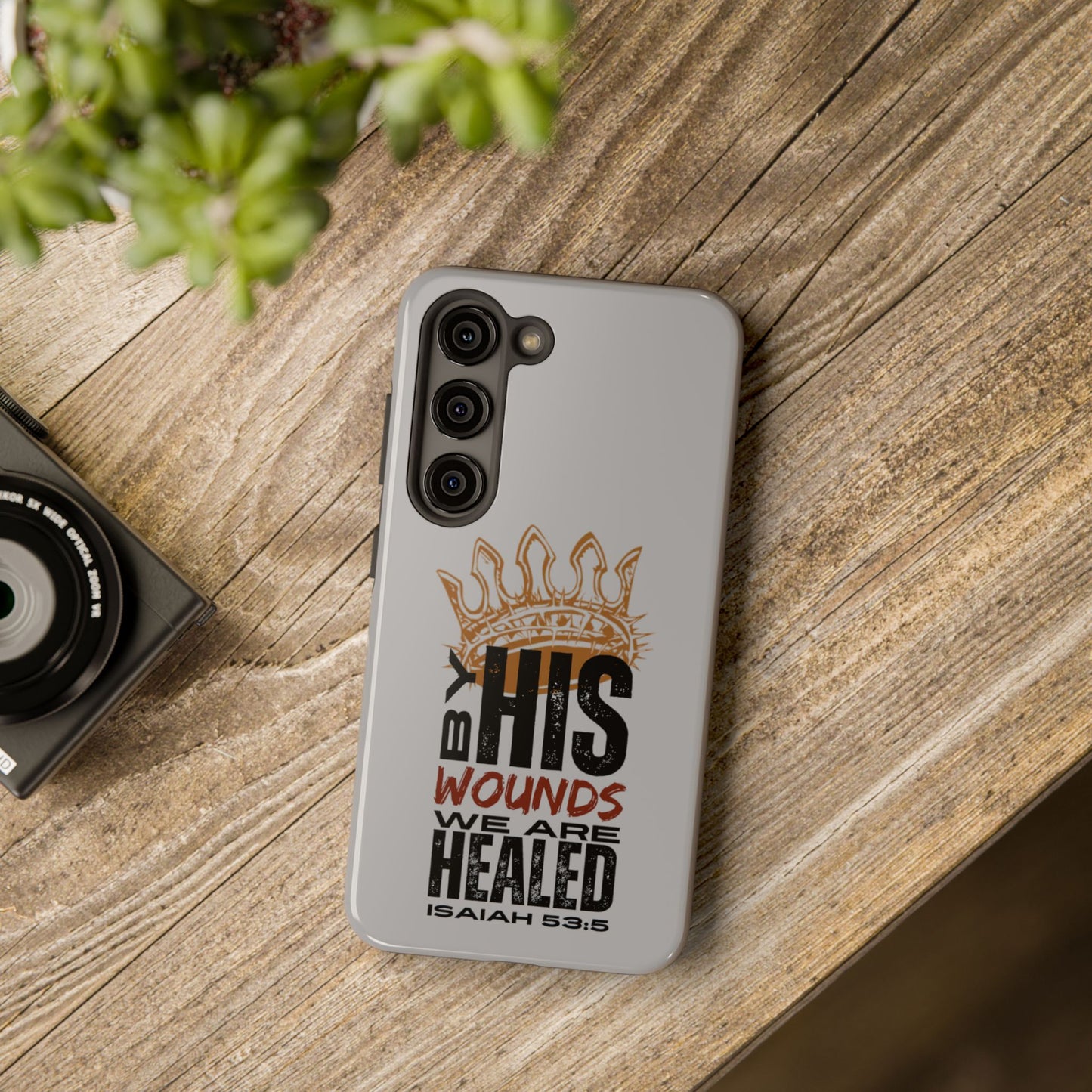 Logos gray scripture phone cover with Isaiah 53:5 design and protective camera cutouts