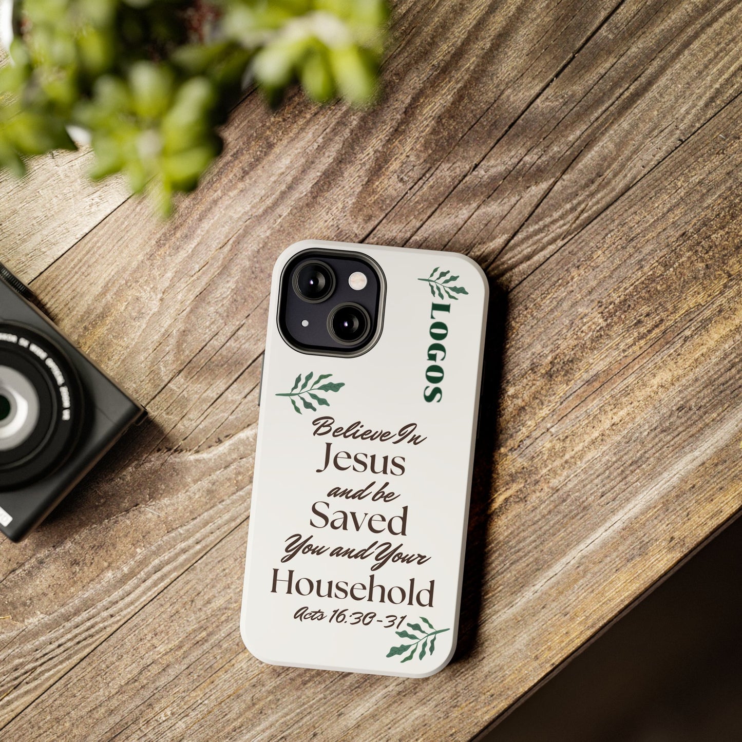 Logos Co. Bible verse tough phone case with inspirational Christian text and decorative leaves on white background