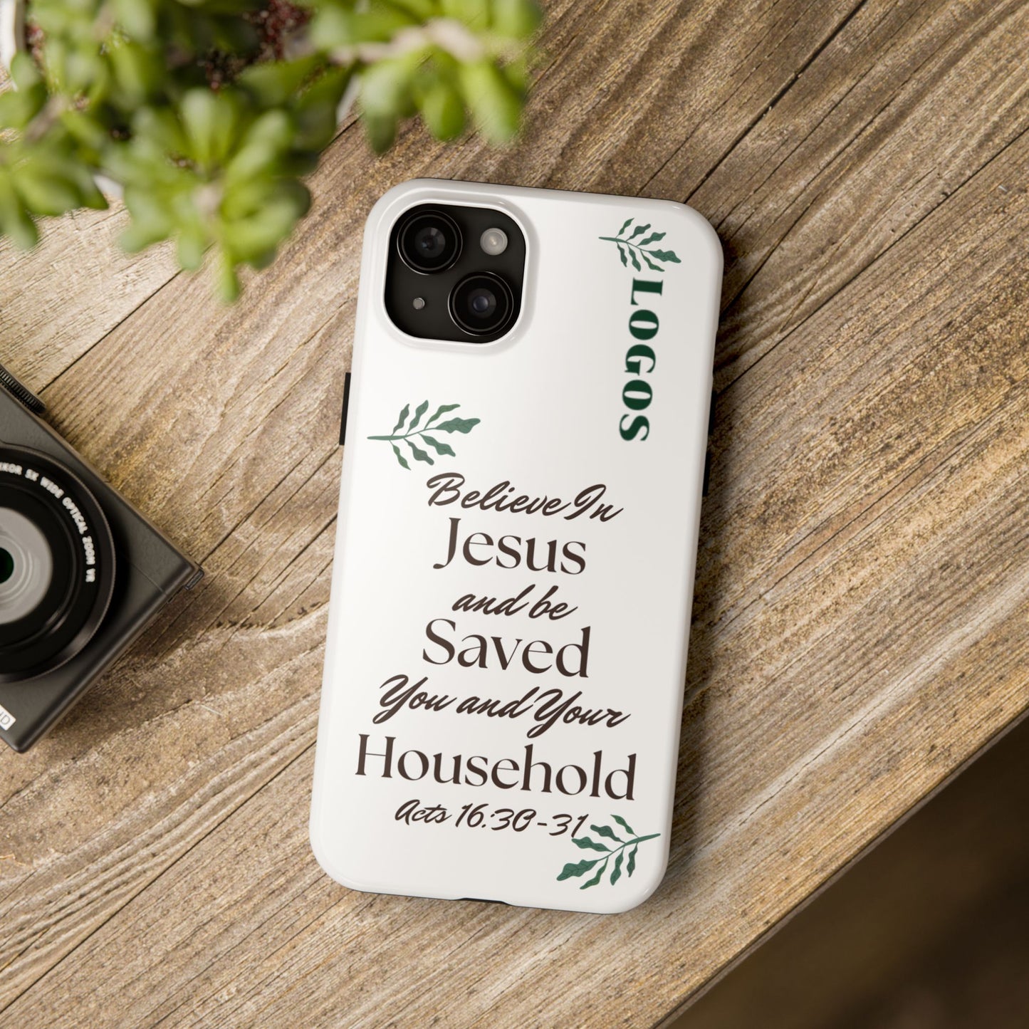 Logos Bible verse phone case with Acts 16:30-31 scripture and decorative green leaves