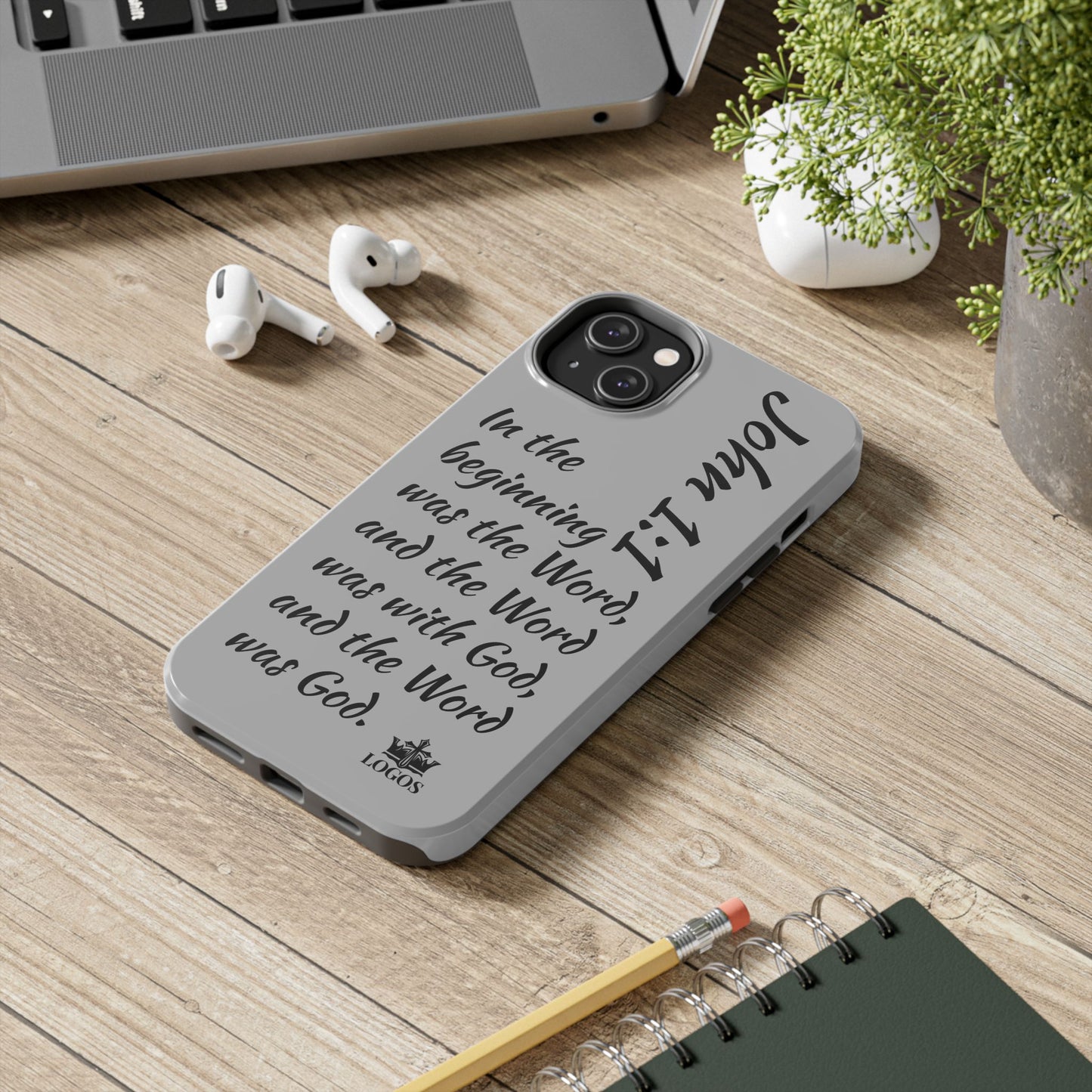 Logos Bible verse phone case with John 1:1 scripture text on gray protective iPhone cover