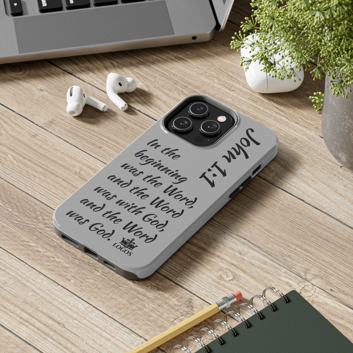Logos Co. Bible verse phone case with John 1:1 scripture text on gray background for iPhone