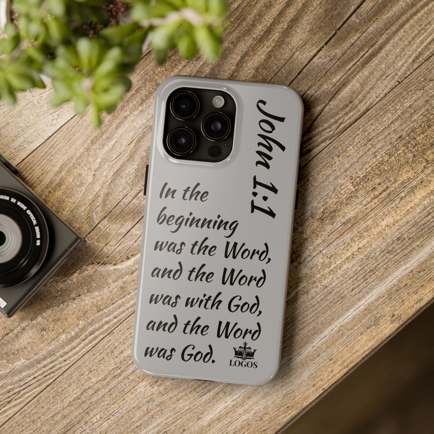 Bible verse phone case with John 1:1 scripture design on gray protective cover