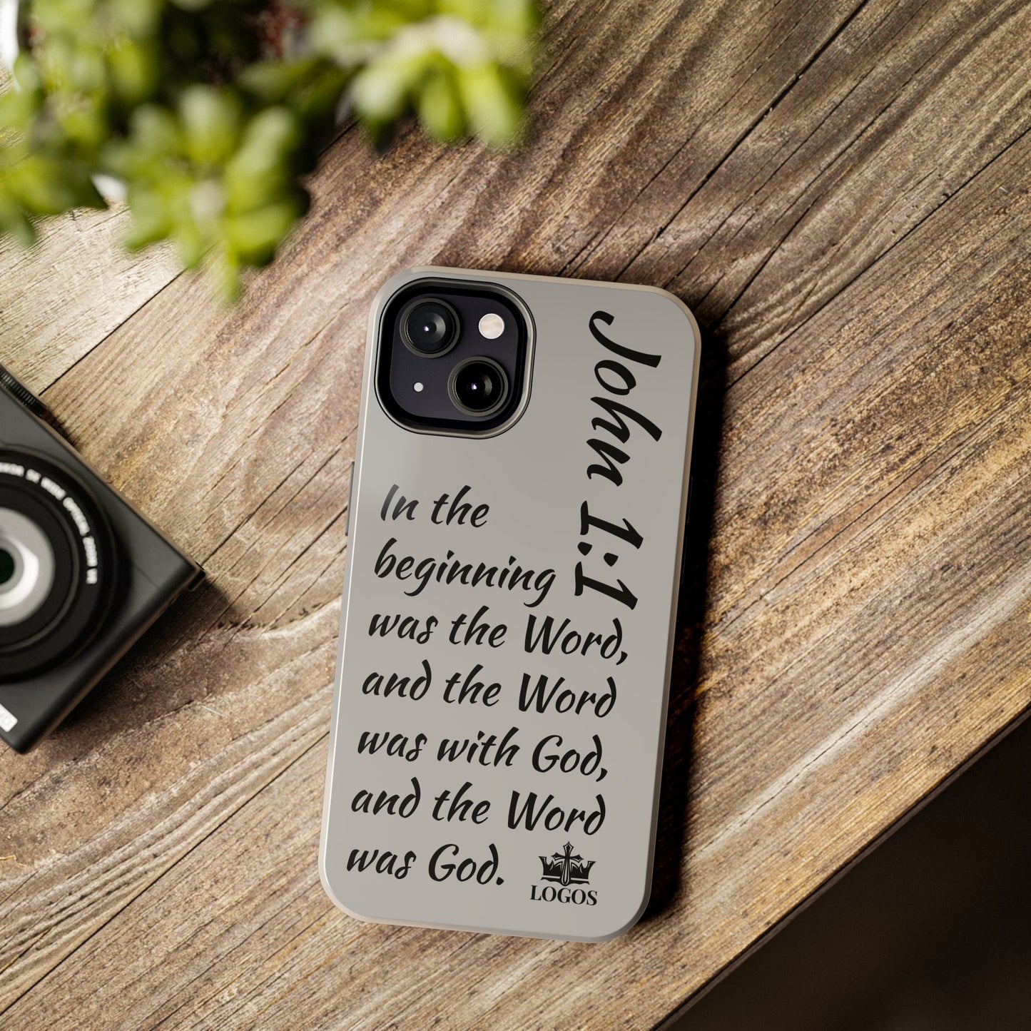 Logos Bible verse phone case with John 1:1 scripture text on gray protective cover for iPhone's