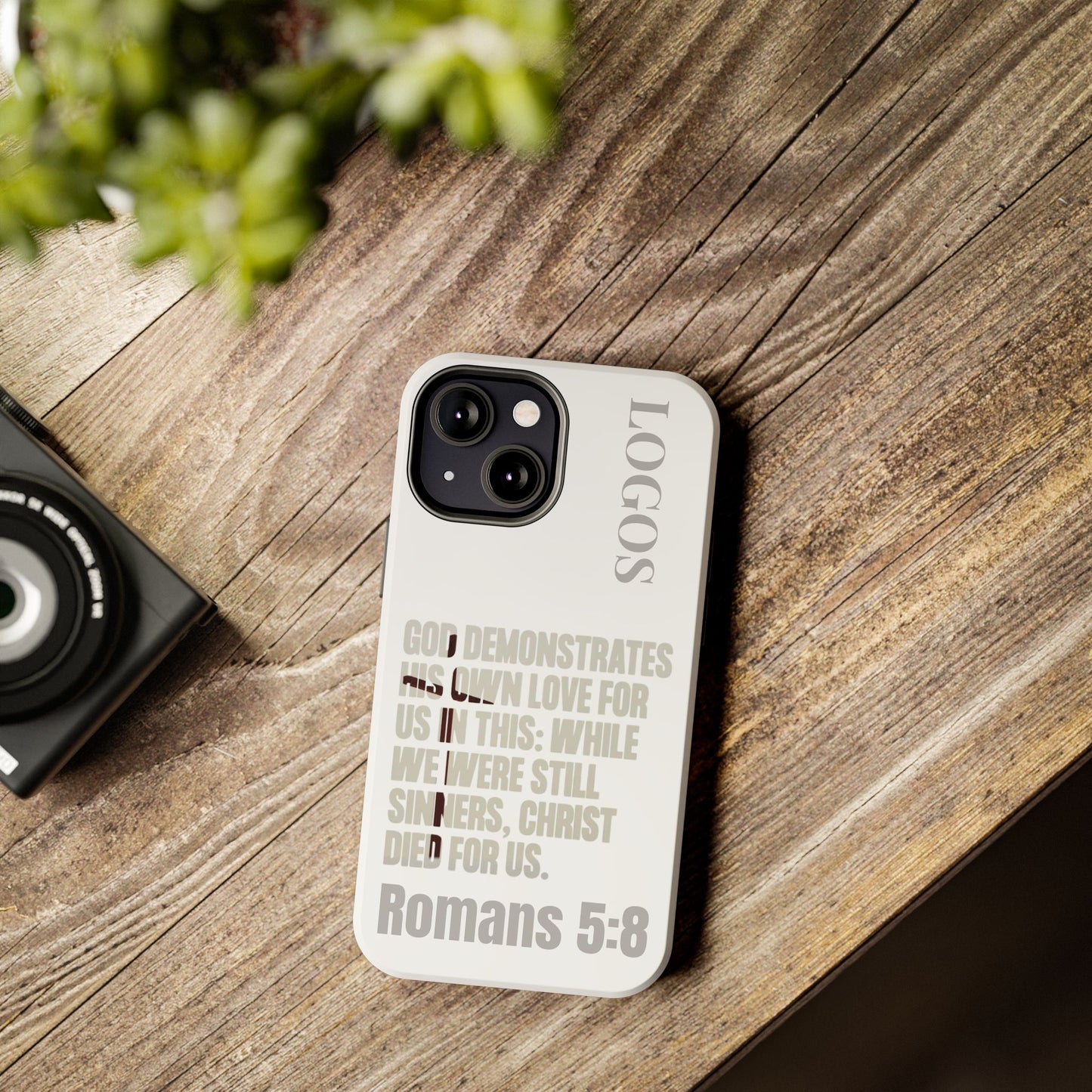 Logos Co. faith-based tough cases phone case with Romans 5:8 scripture text on white background