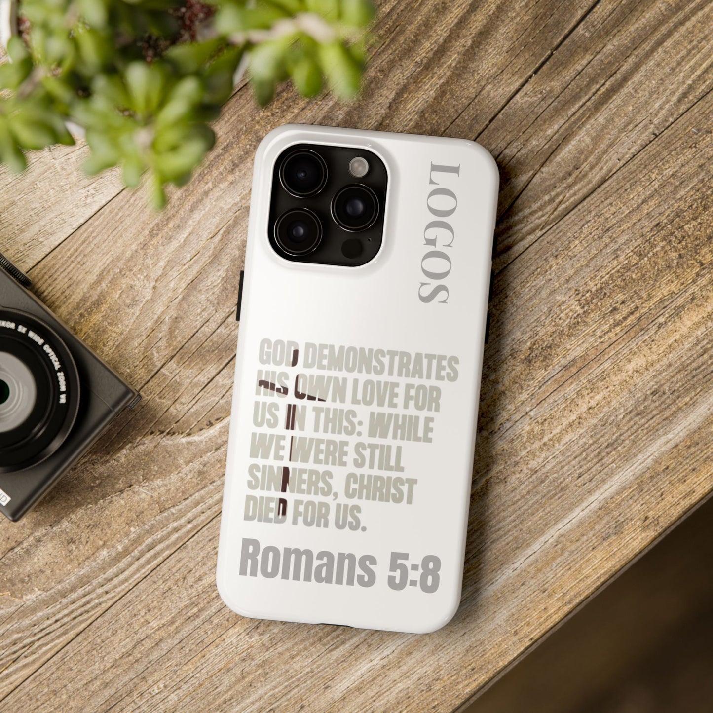 Logos Co. faith-based tough cases phone case with Romans 5:8 scripture on white background