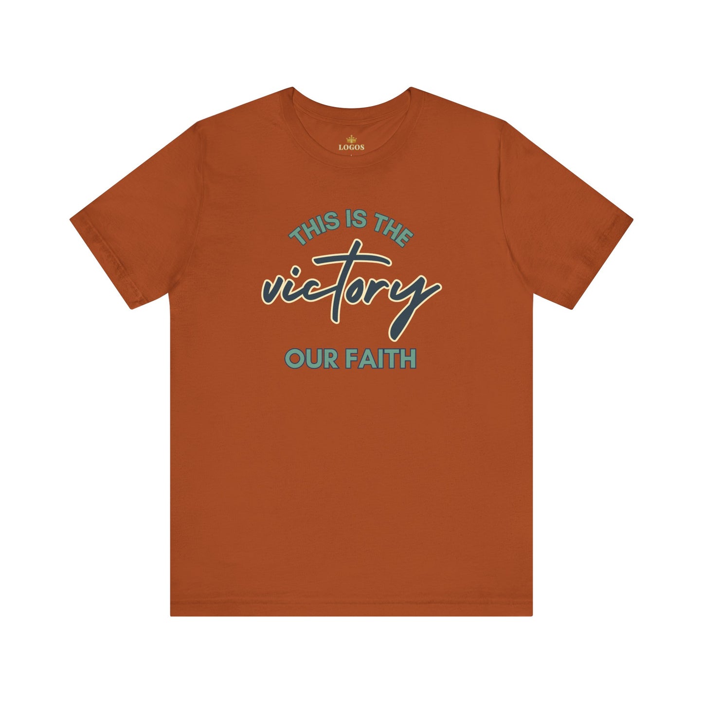 Logos This Is The Victory T-shirt in burnt orange color with faith-themed text design