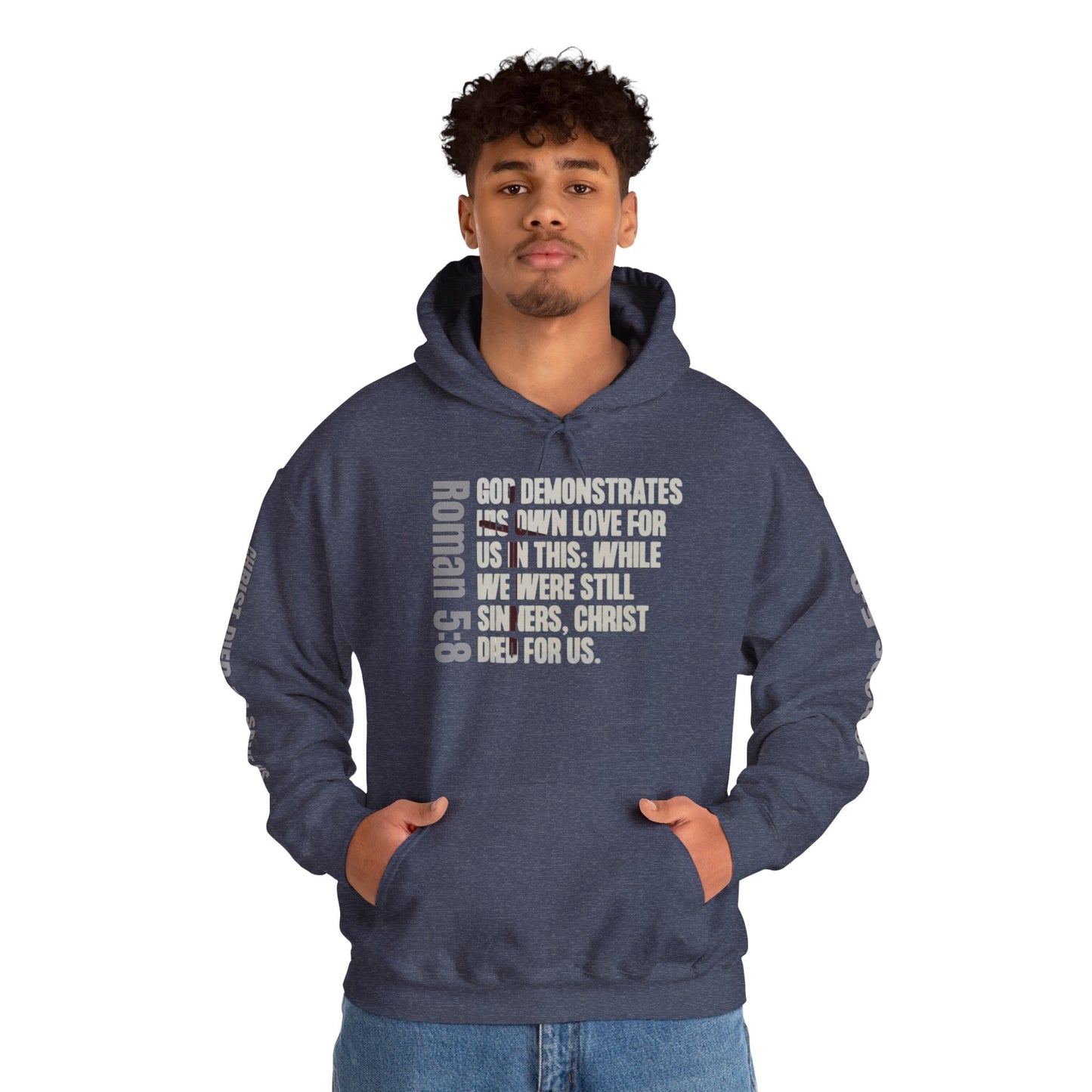Logos Co. Heather Sport Navy Blue Romans 5:8 hoodie with Christian scripture text on front worn by male model