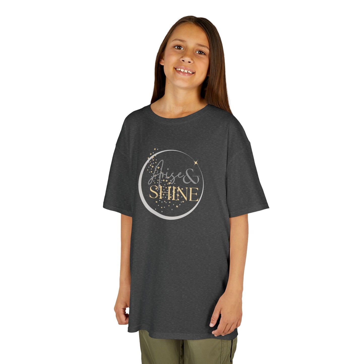 Girl wearing dark gray Scripture design junior shirt with Arise and Shine text and star graphics