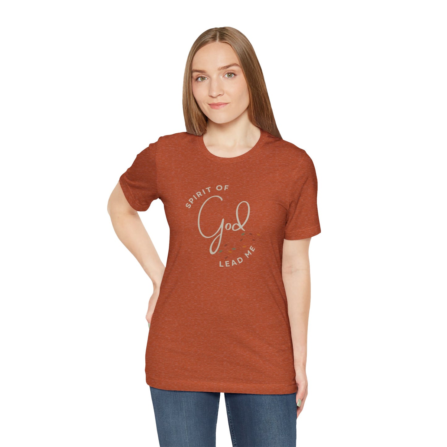 Woman wearing a brown Spirit Lead Me shirt with a spiritual message from Logos