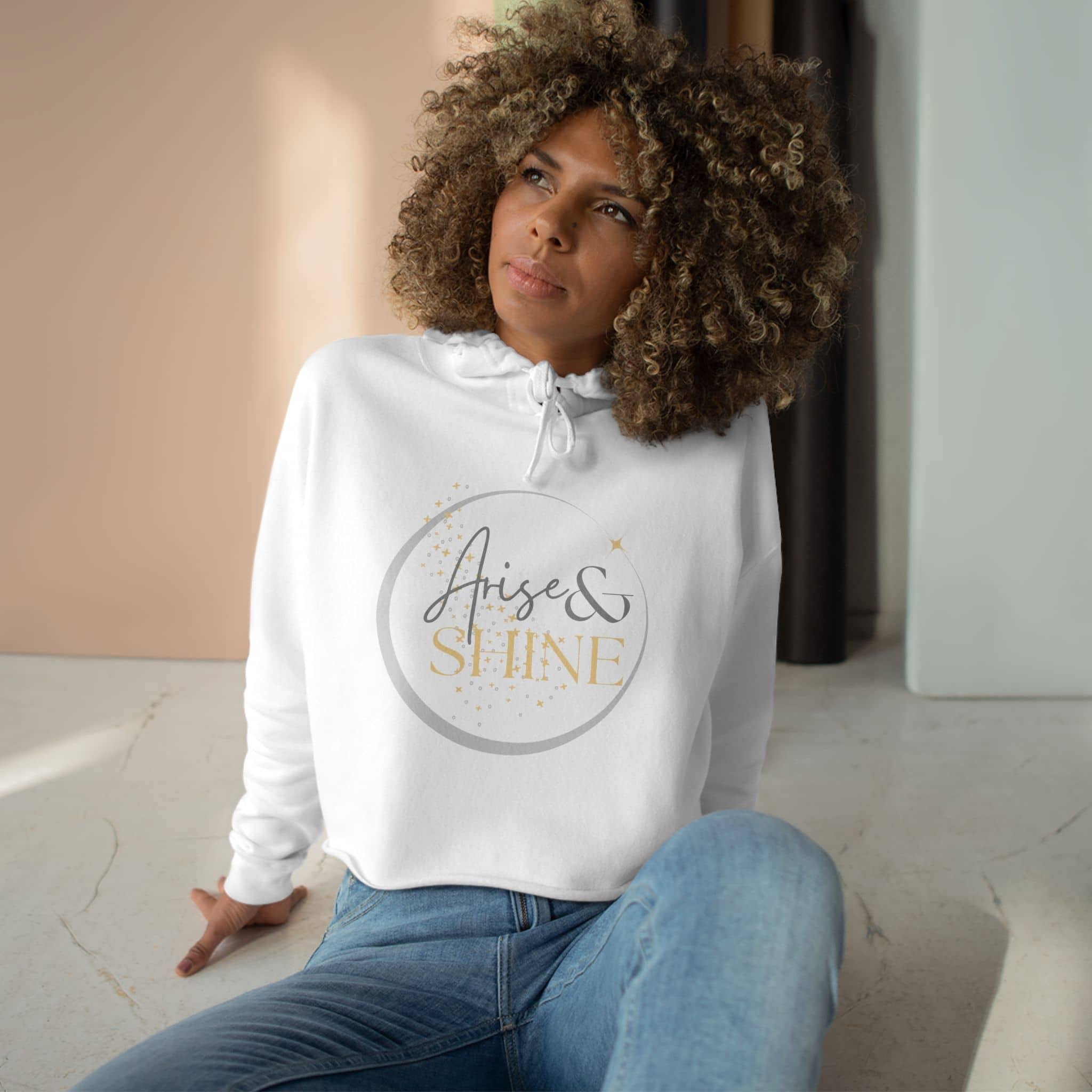 Arise & Shine Christian women's crop hoodie in white with modern graphic design on a model