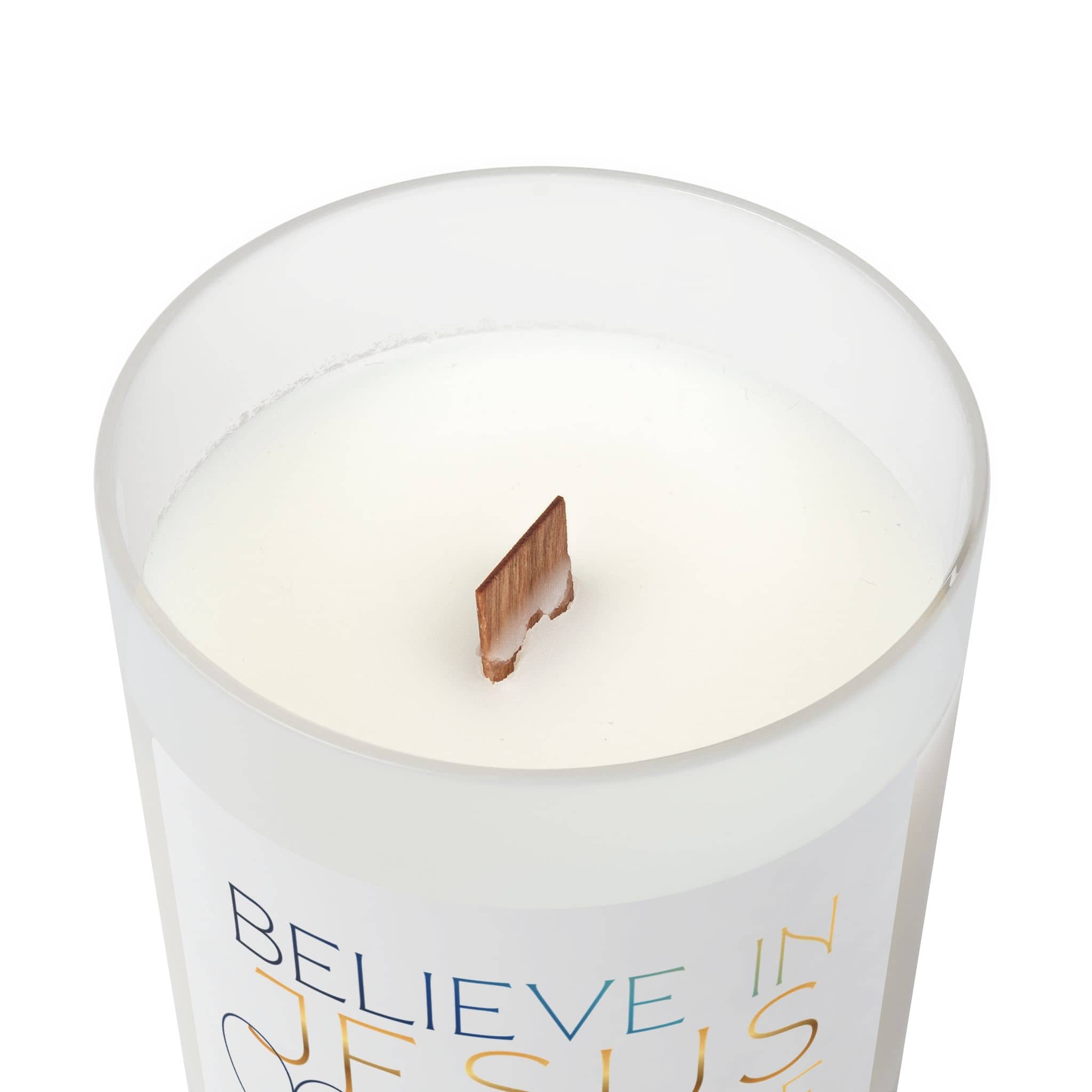 Frosted glass candle with the phrase Believe in Jesus & Love, featuring a wooden wick