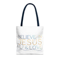Canvas Believe in Jesus & Love Tote Bag in white with navy blue handles, showing front design