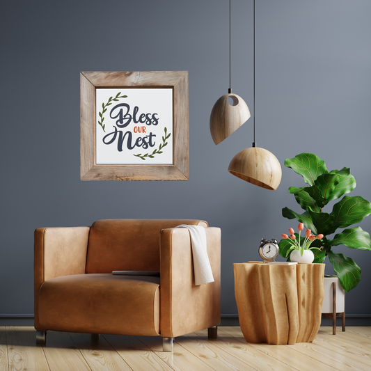 Bless Our Nest 16 x 16 Matte Canvas Wall Art Home Decor with 'Bless Our Nest' phrase in a rustic frame on a living room wall