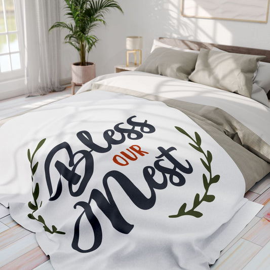 Cozy Bless Our Nest fleece blanket featuring elegant lettering and leafy accents for stylish home decor