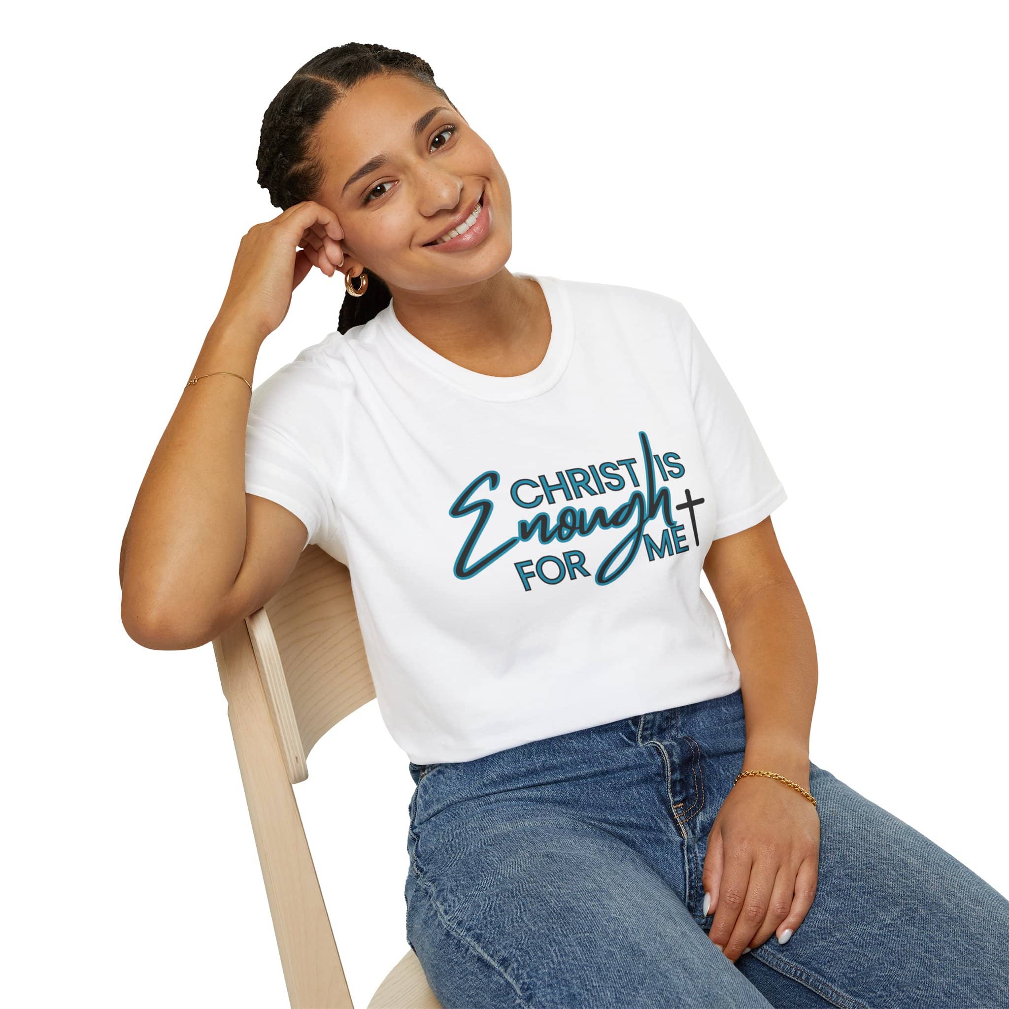 Christ is enough shirt on a woman sitting, featuring a modern and stylish design in white
