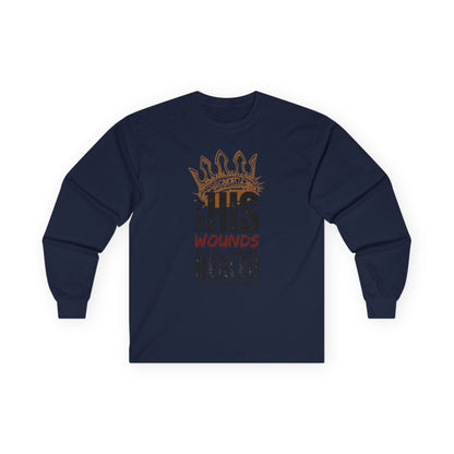 Christ our Healer shirt with a crown design and inspirational text on a navy long-sleeve fabric