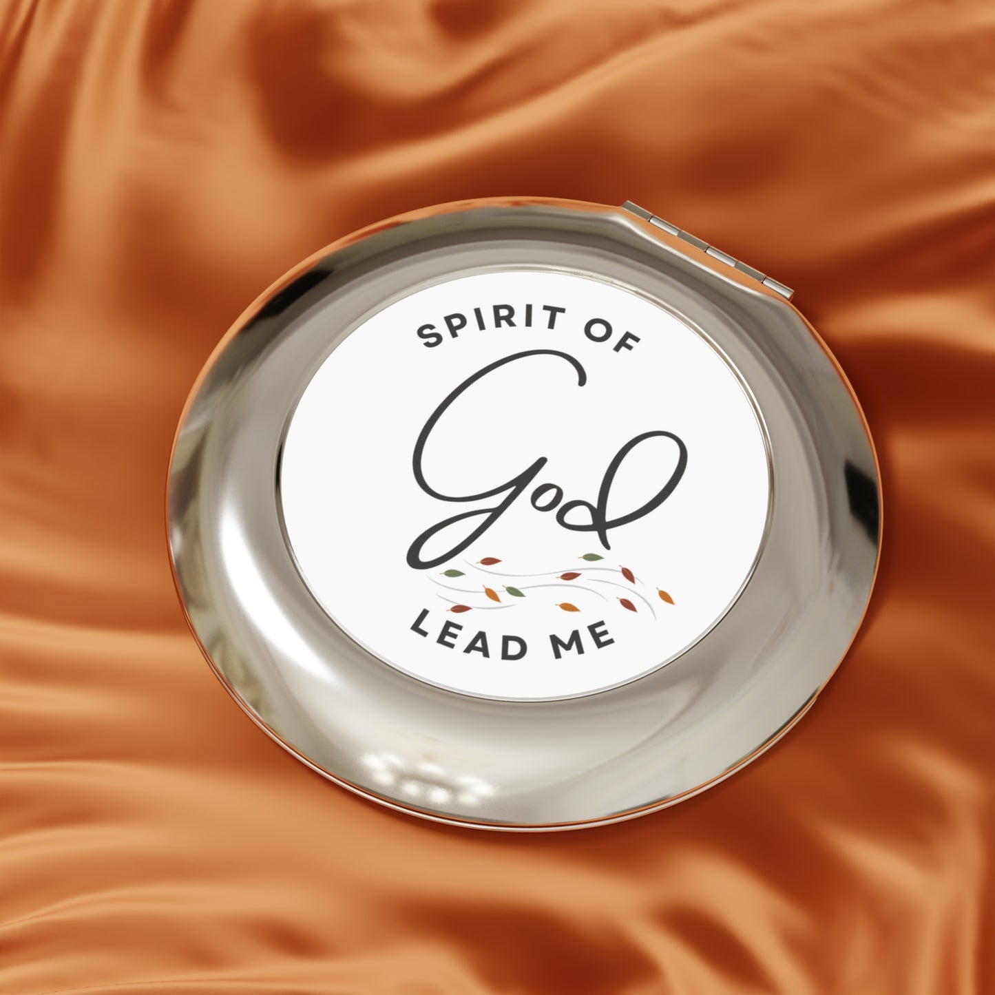 Christian compact mirror featuring the phrase Spirit of God Lead Me on a sleek surface