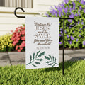 Christian garden banner with Bible verse Acts 16:31 and decorative leaves on white background