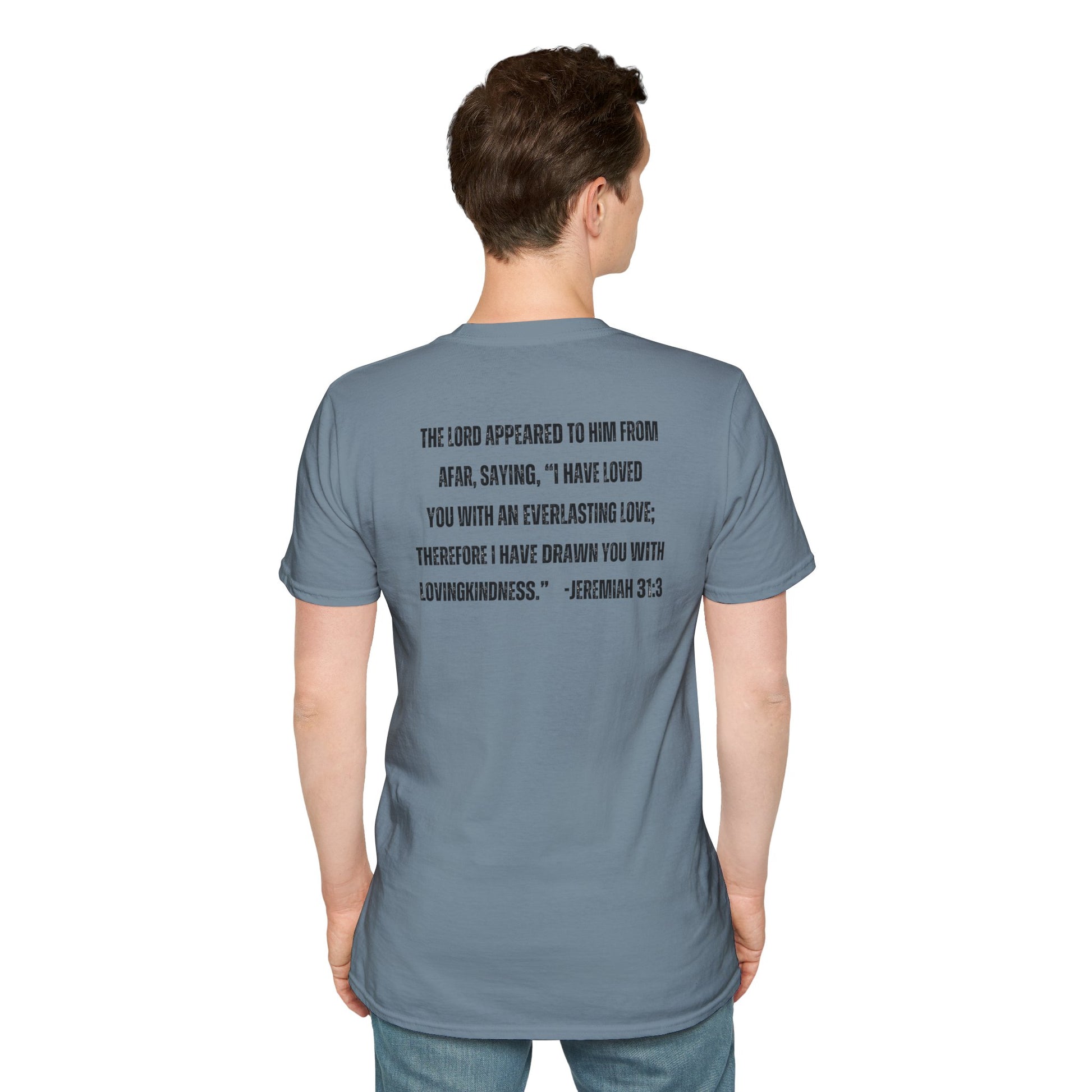 Back view of man wearing a stone blue Christian graphic t-shirt with a Jeremiah 31:3 Bible verse printed