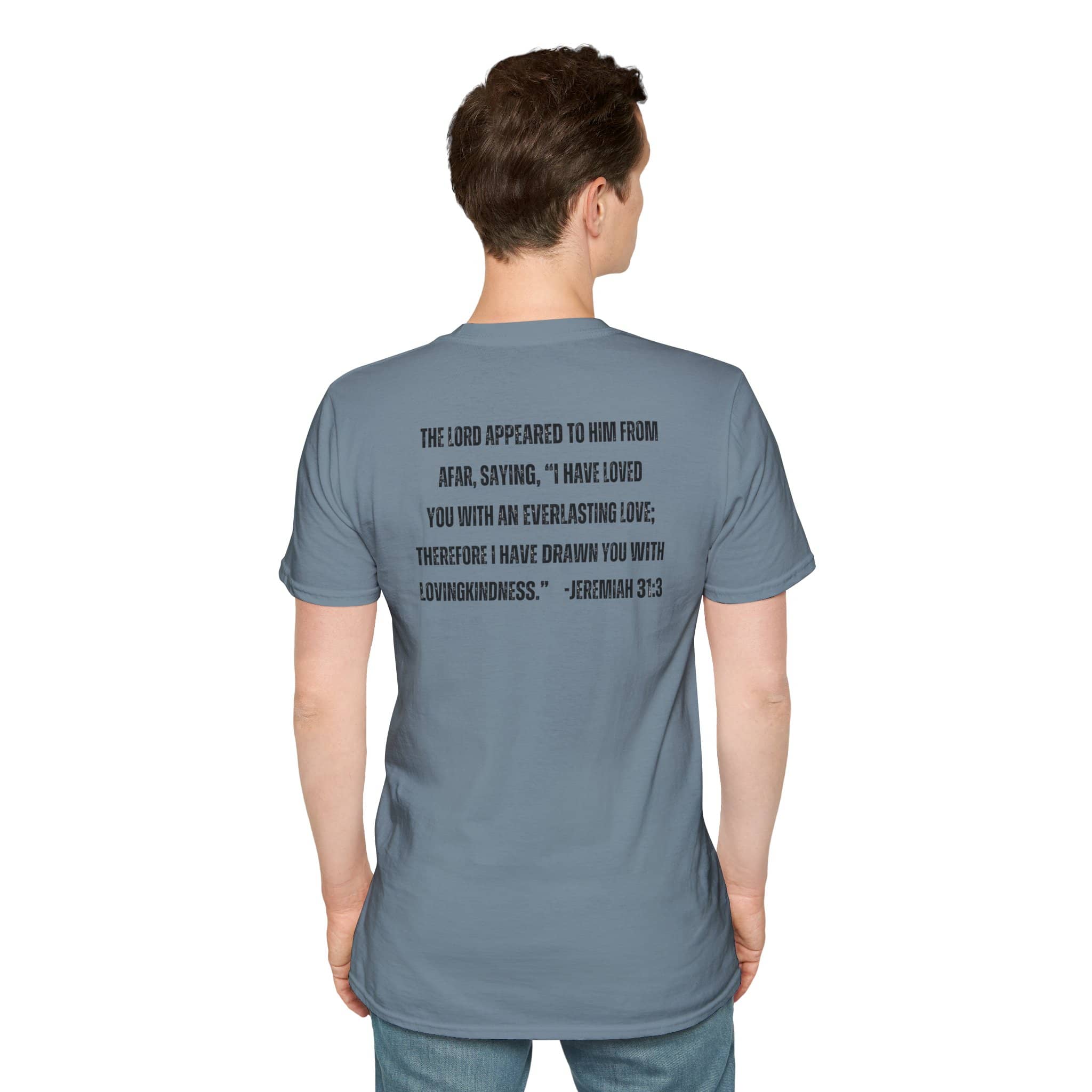 Back view of man wearing a stone blue Christian graphic t-shirt with a Jeremiah 31:3 Bible verse printed