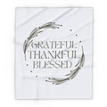 Christian home decor blanket featuring the words Grateful Thankful Blessed with a simple design