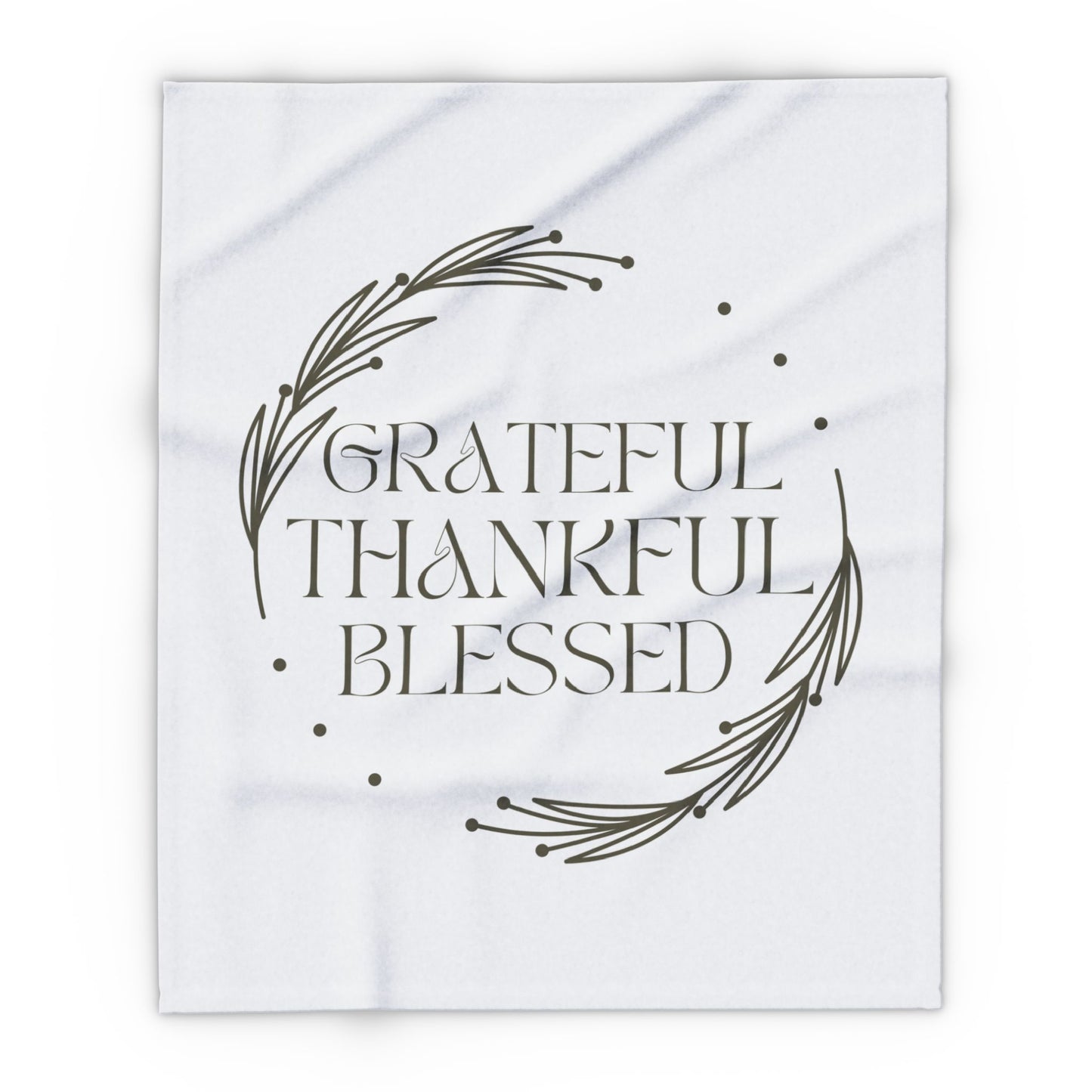 Christian home decor blanket featuring the words Grateful Thankful Blessed with a simple design