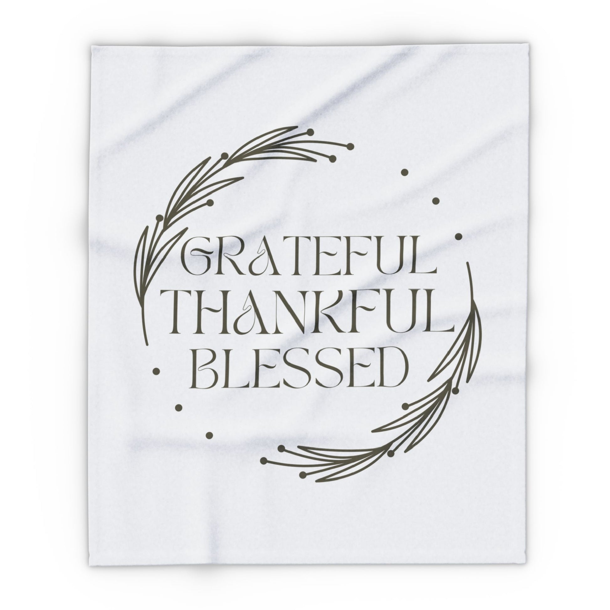 Christian home decor blanket featuring the words Grateful Thankful Blessed with a simple design