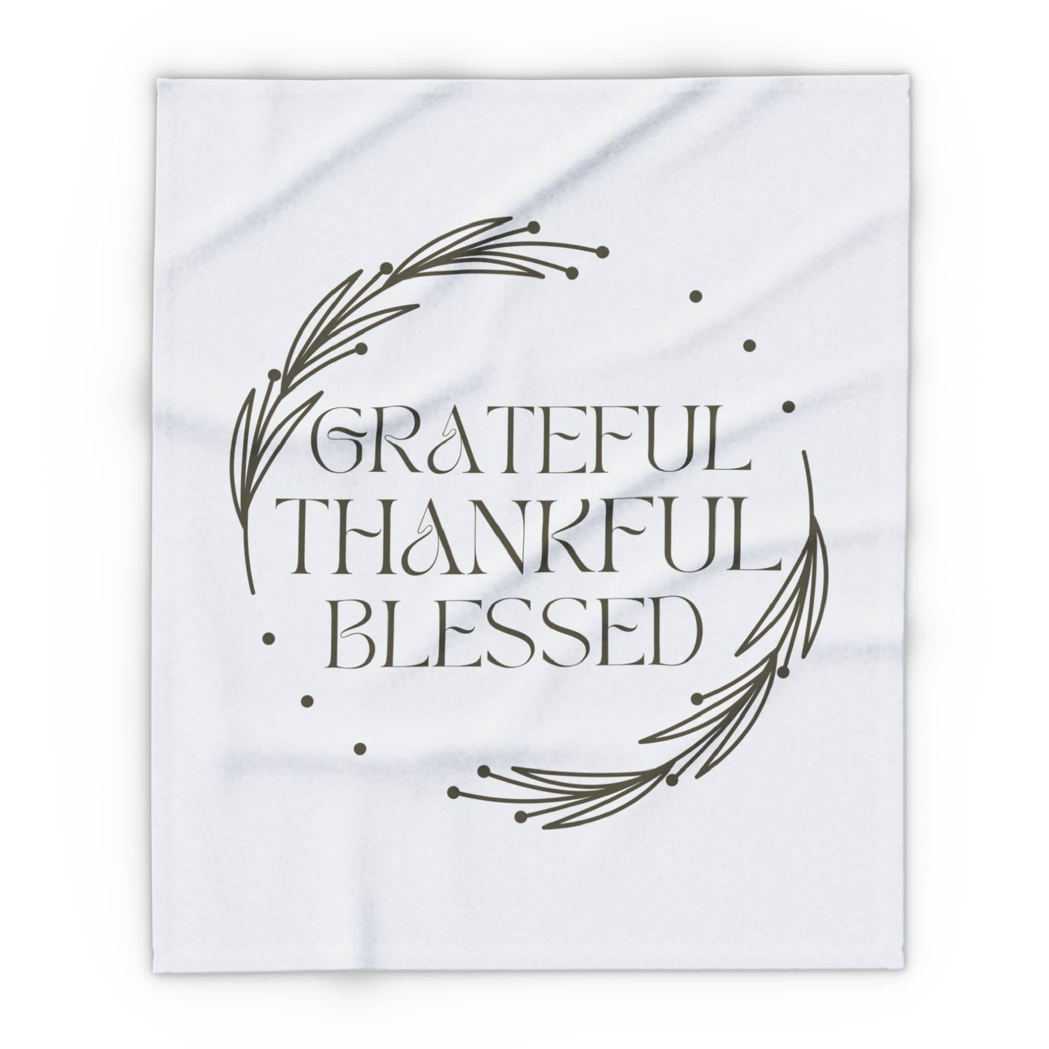 Christian home decor blanket featuring the words Grateful Thankful Blessed with a simple design