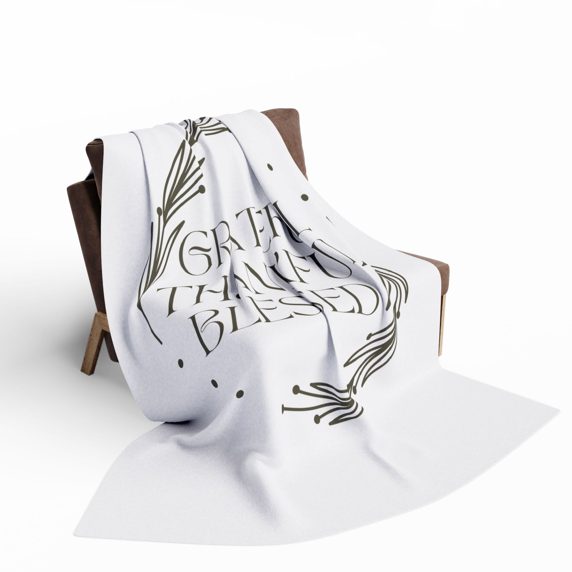 Christian home decor blanket with inspirational message great thankful blessed on a cozy couch