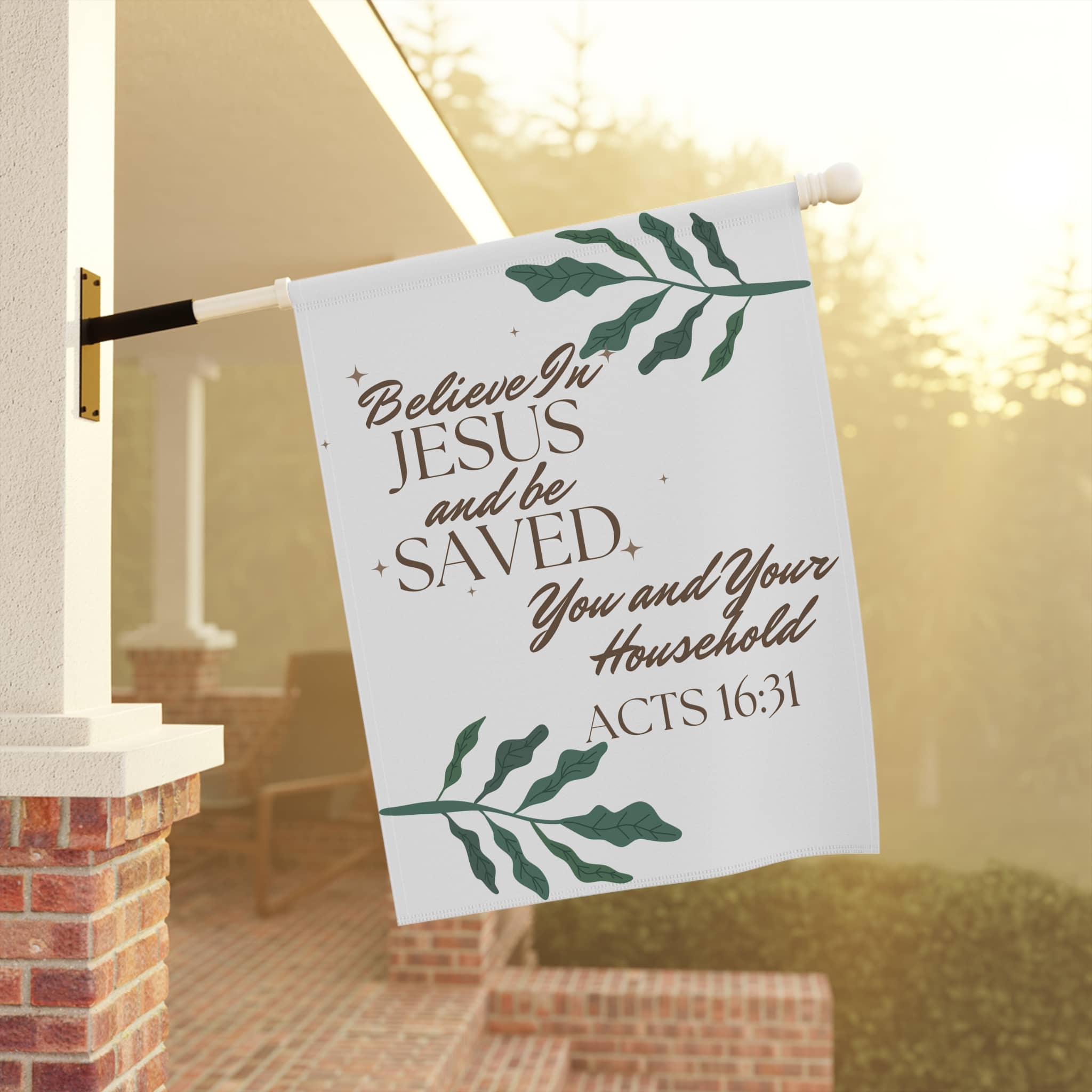 Christian house flags with Believe in Jesus and be Saved scripture design hanging outside a home