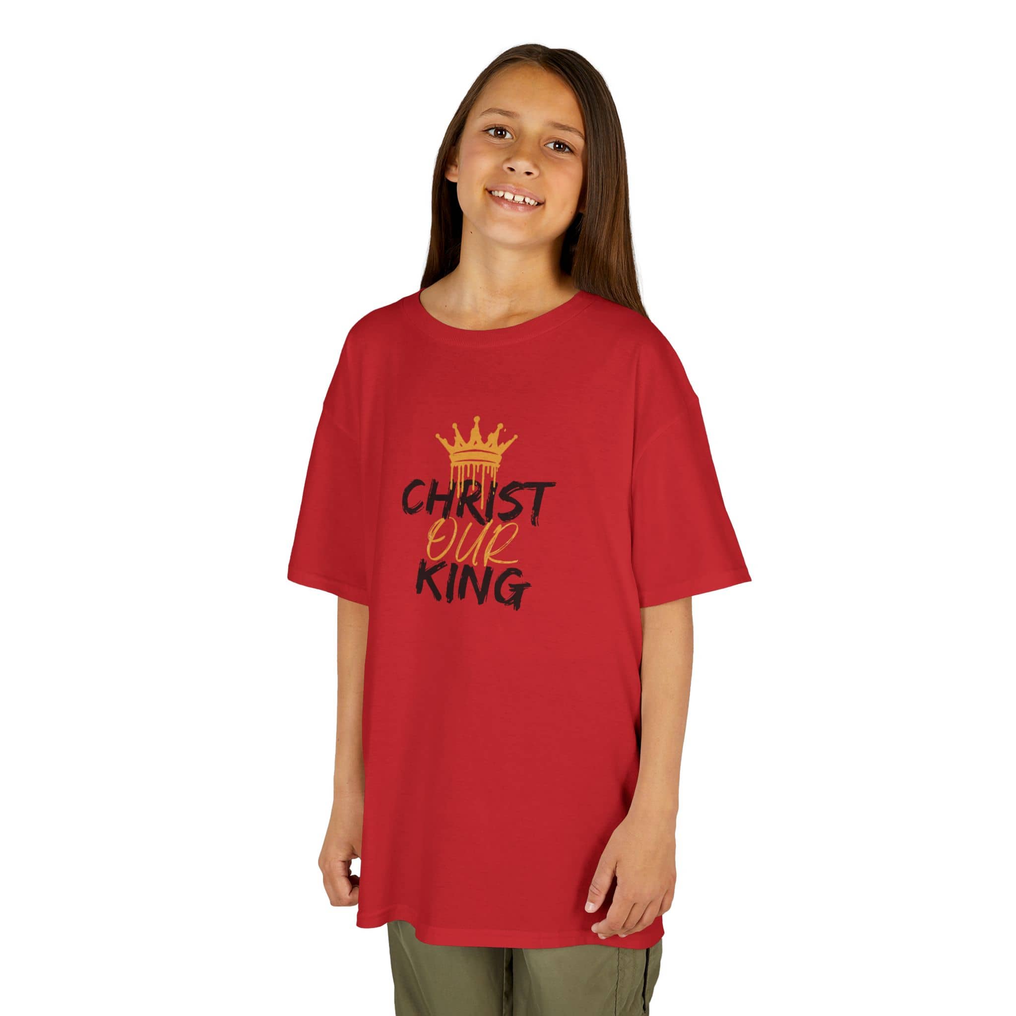 Red Christian junior kids t-shirt with Christ Our King design worn by a girl 