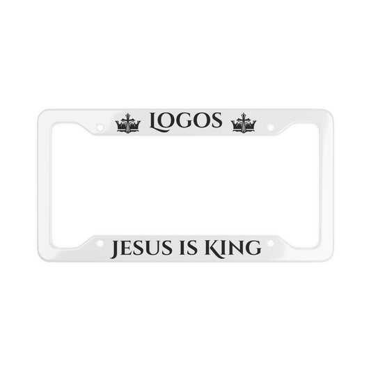 White Christian license plate frame with 'Jesus Is King' and crown designs for vehicle display