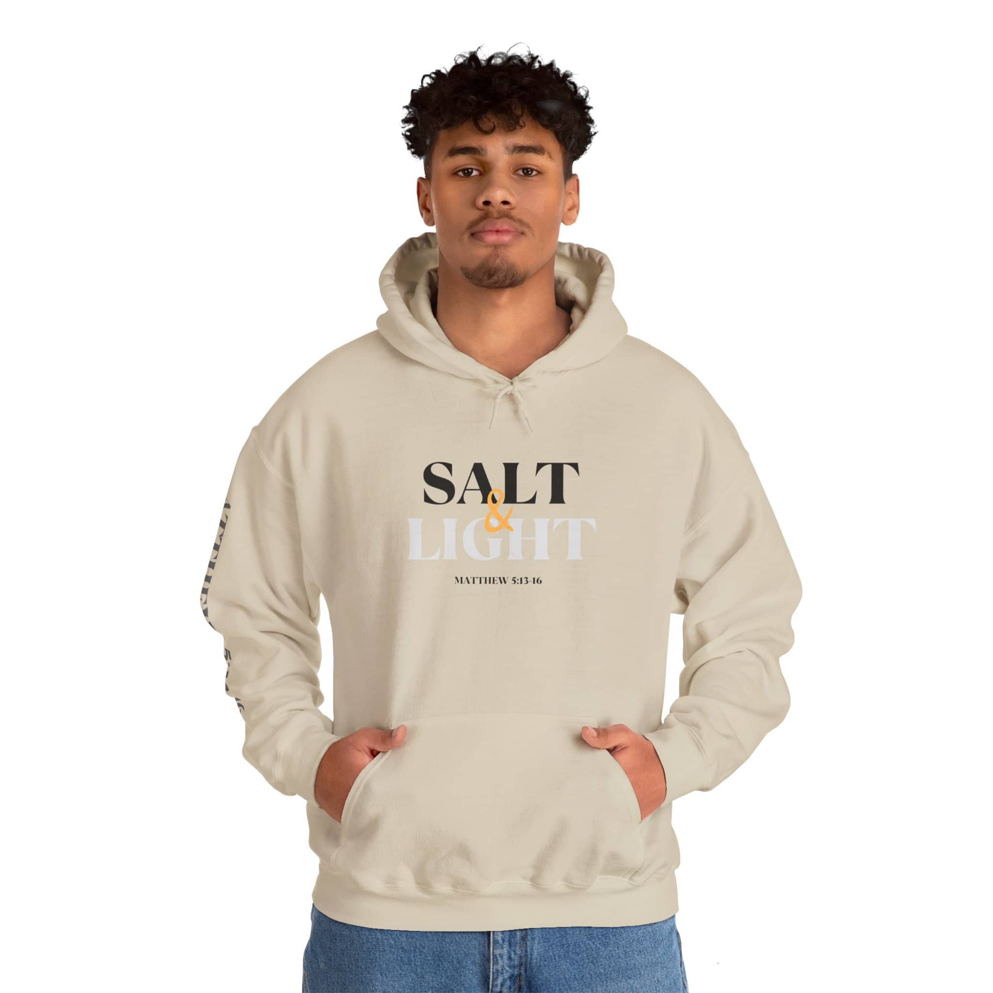 Beige Logos Co. Salt & Light - Christian scripture hoodie worn by a man with both hands in front pocket