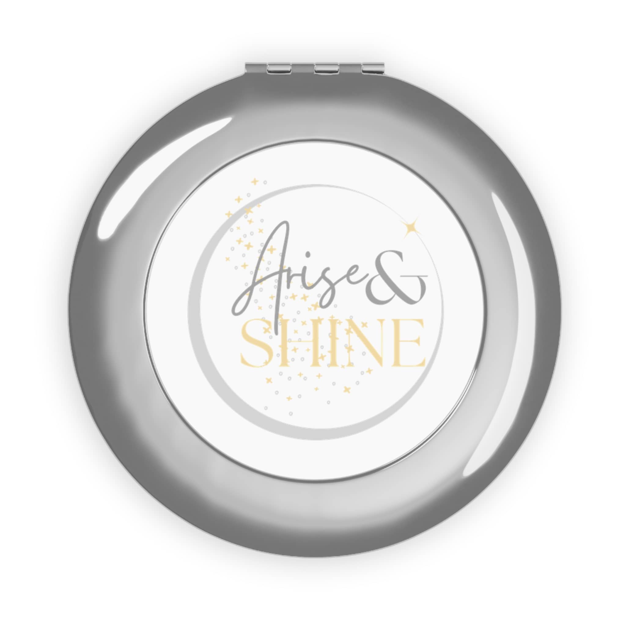 Christian travel mirror with 'Arise & Shine' design in a sleek silver case