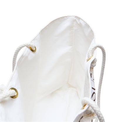 Interior of a spacious Christian weekender bag featuring durable white fabric and gold eyelets