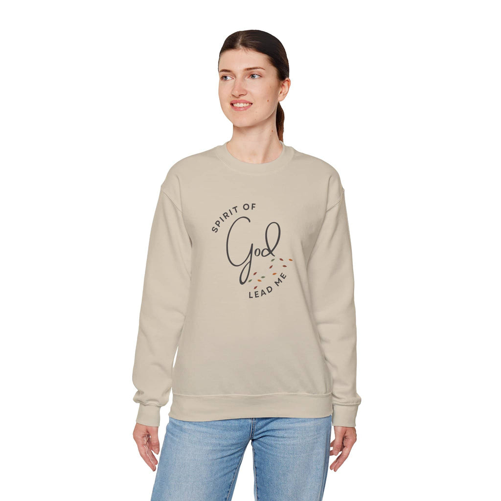 Logos beige Christian women's sweatshirt with Spirit of God Lead Me text worn by smiling woman